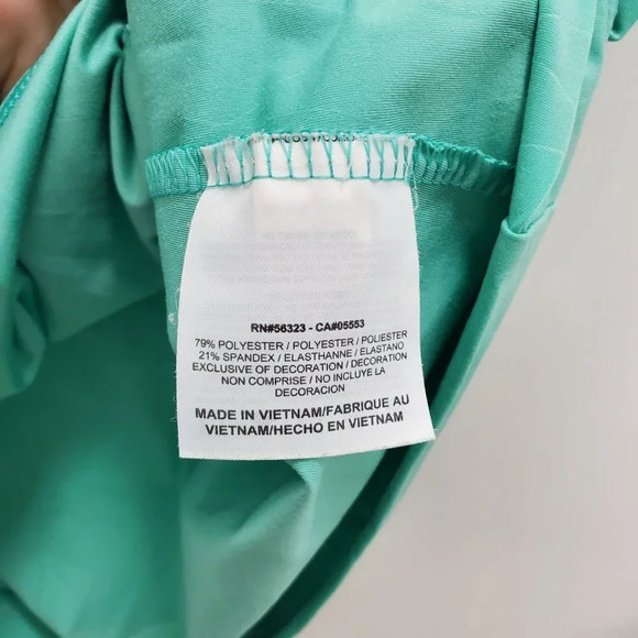 NikeGolf Dri-Fit Women's Troon AZ Turquoise Center Swoosh Snap Button Polo Sz M - Picture 5 of 6